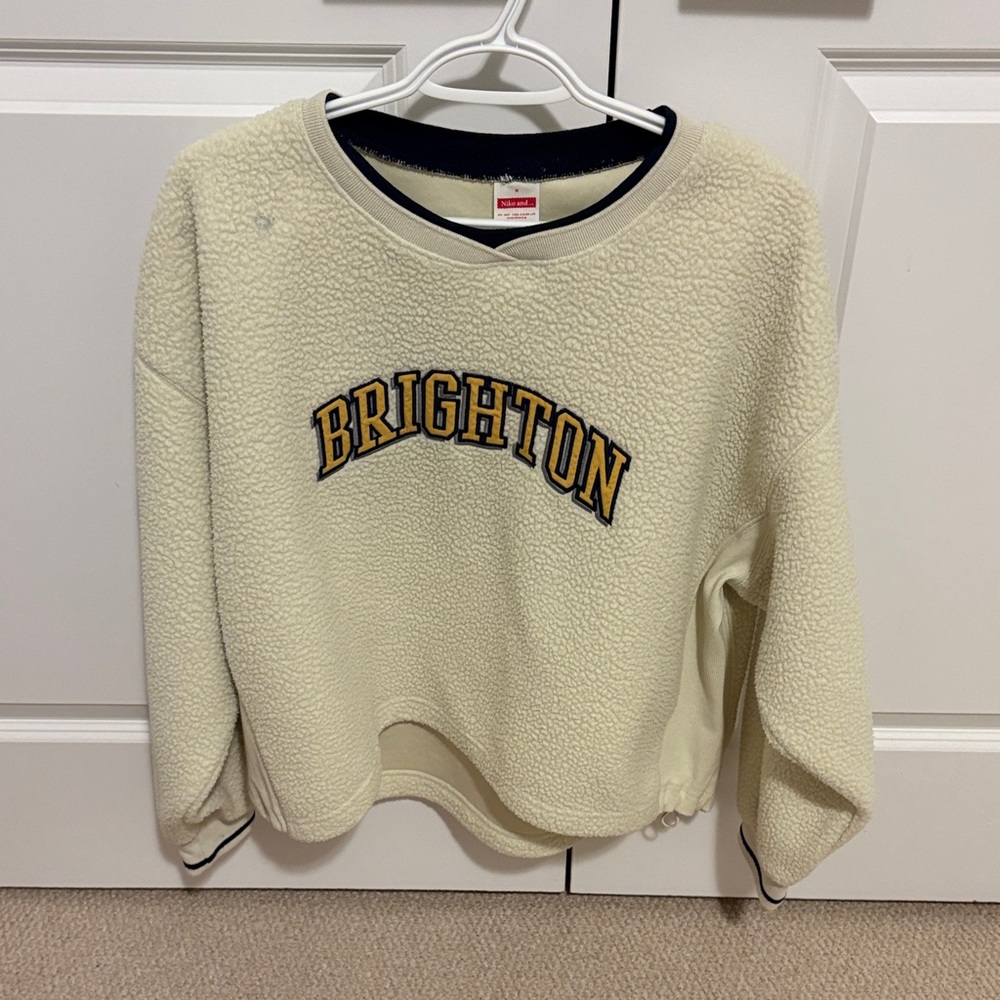 Brighton Off-White Fleece Sweatshirt with Black Accents